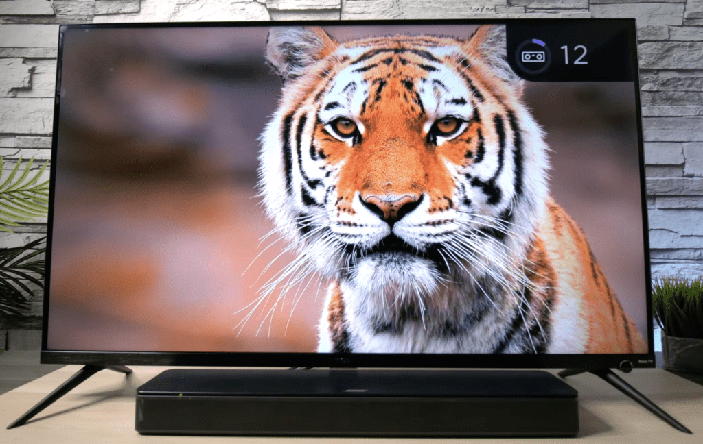 Photo of a TV with a soundbar connected to it