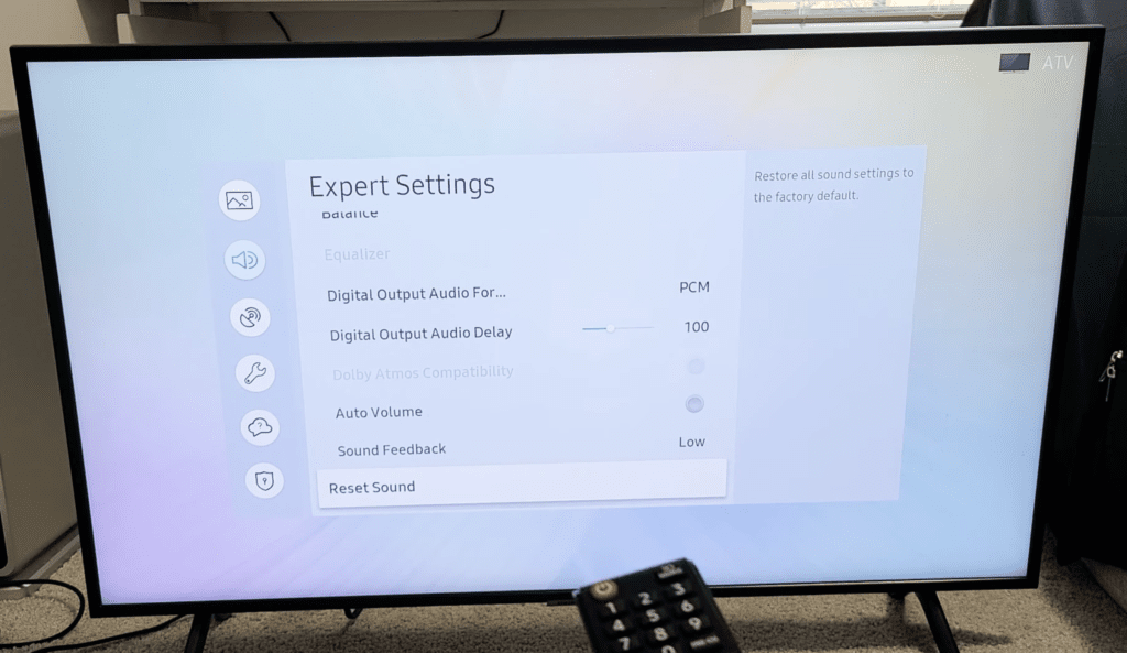Photo of someone resetting the sound settings of a Samsung TV