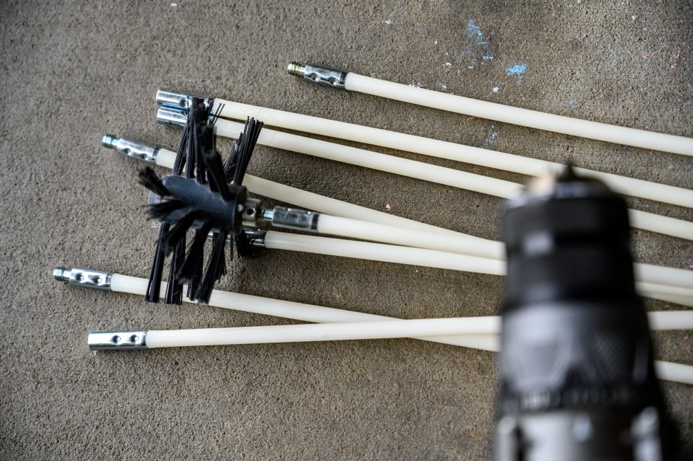 a drill and a vent cleaning kit