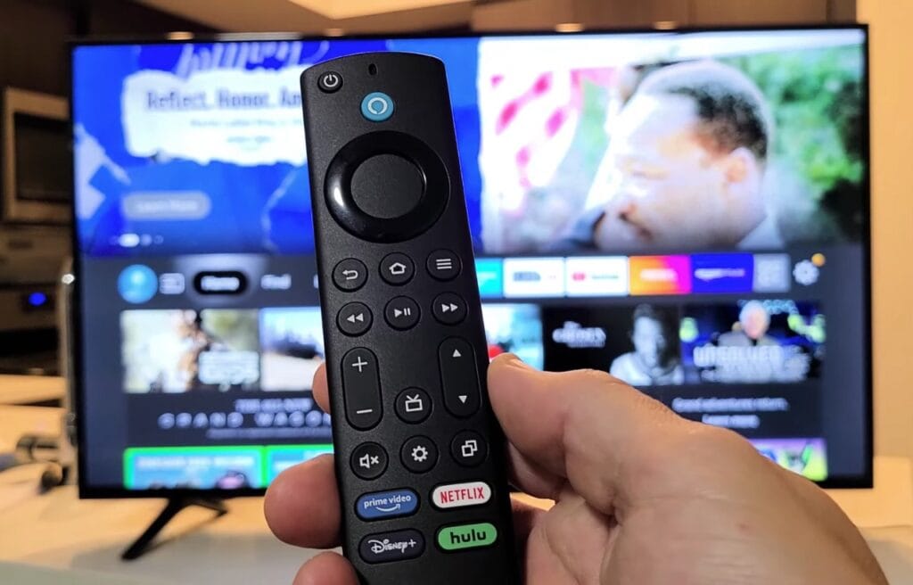 hand holding a Firestick remote