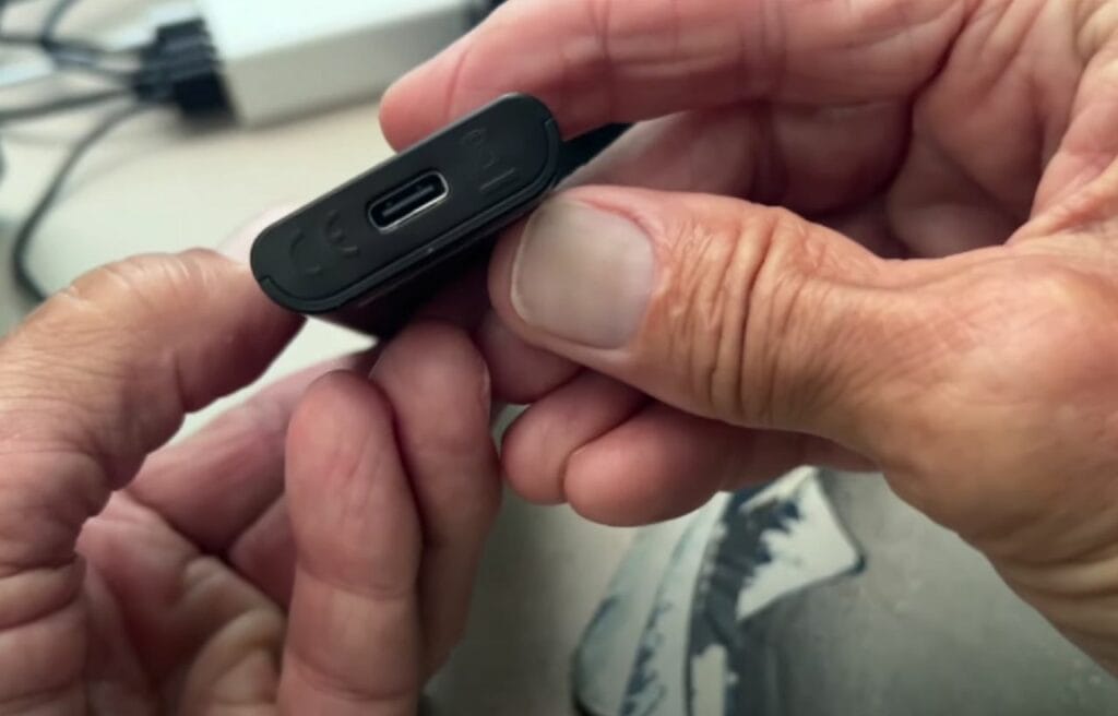 Showing the type-c charging port of a Samsung remote