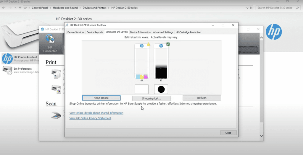 Checking the ink cartridge of the HP printer on the laptop