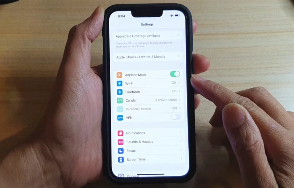 Turning on the airplane mode in settings of an iPhone