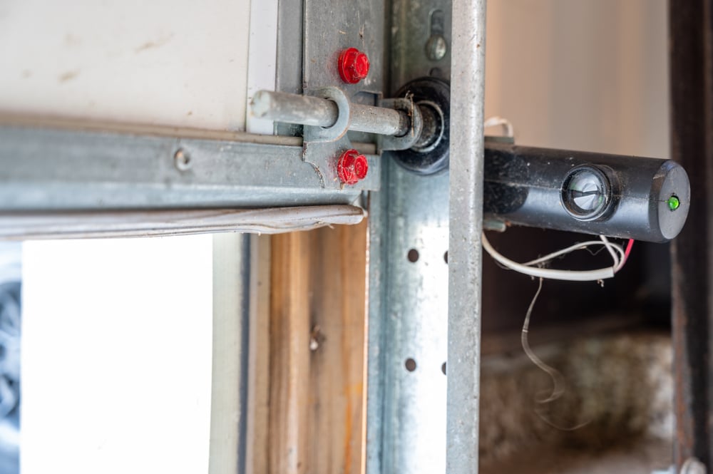 Close up photo of the garage door sensor 