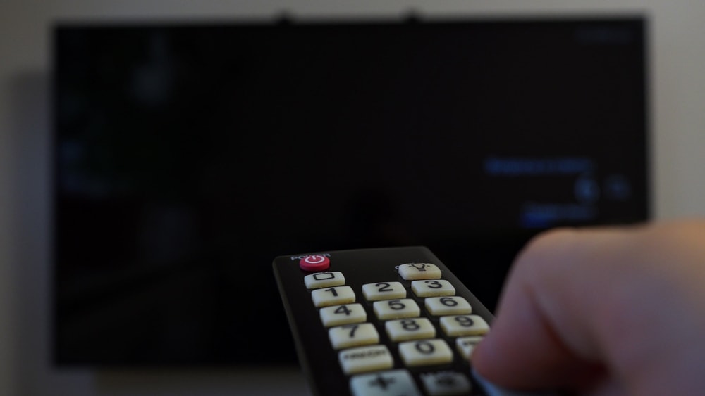 trying to turn on the TV using a remote 