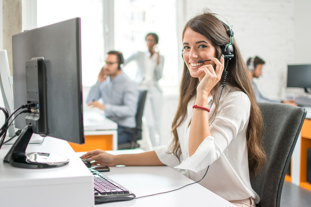 Call center agent looking at the camera