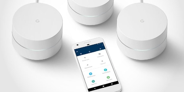 Google wifi on white table