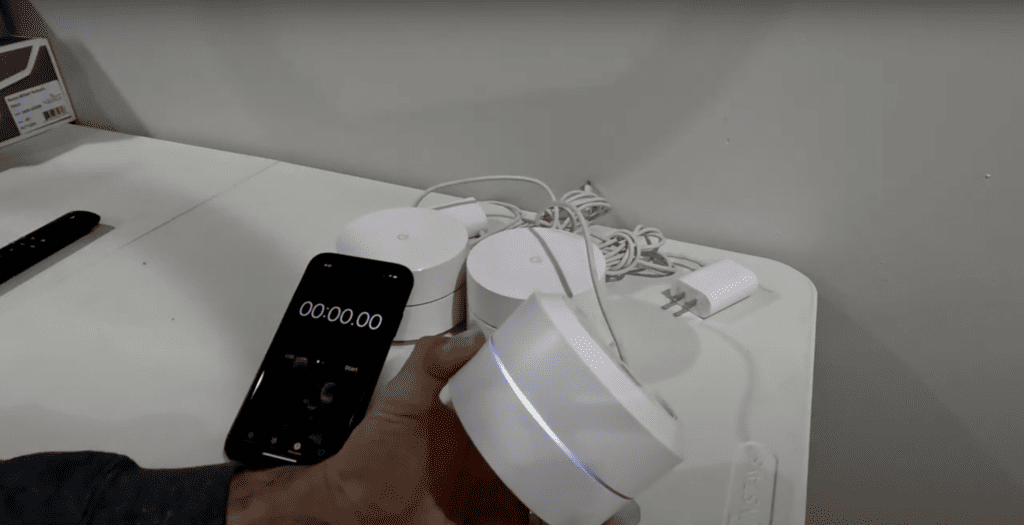 Resetting the Google Wi-Fi mesh by pressing the button